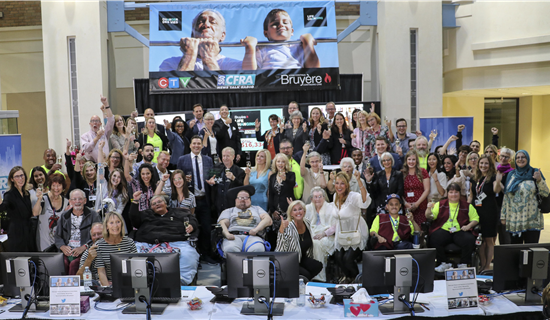 large groupe celebrating with thumbs up