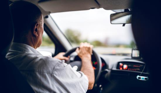 senior man driving