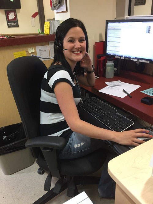 Receptionist at a computer