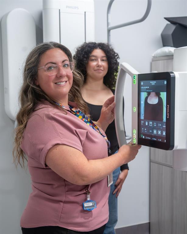 Technicians with medical diagnostic equipment